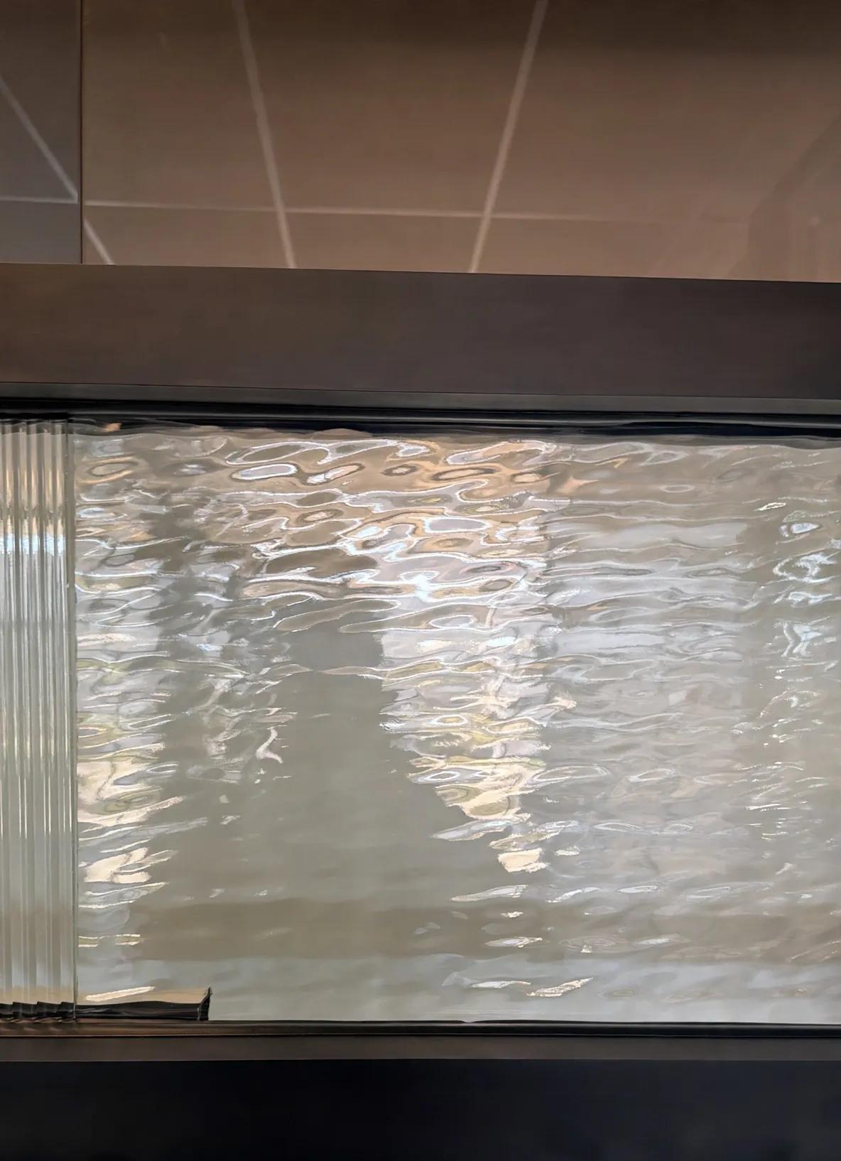 Glas Plus decorative cabinet glass example: glass with a water texture