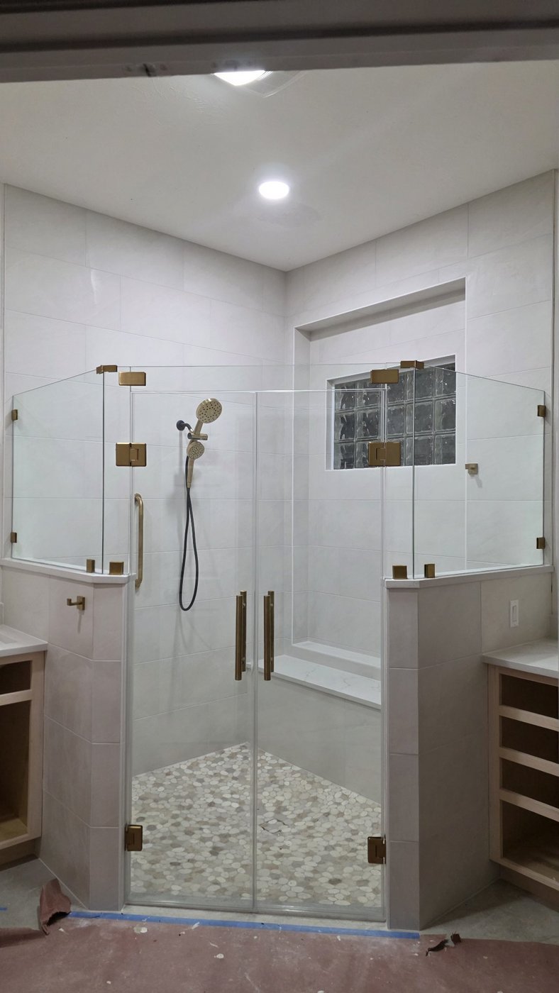 Glas Plus job: 135° angle over half walls with a center double door and gold hardware